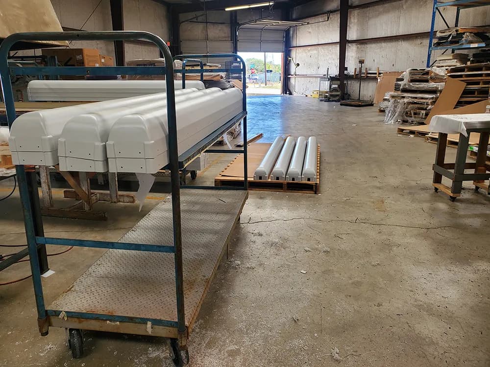 Large thermoformed radomes being inspected on the production floor